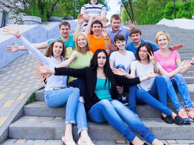 A group of young people posing for a photo.